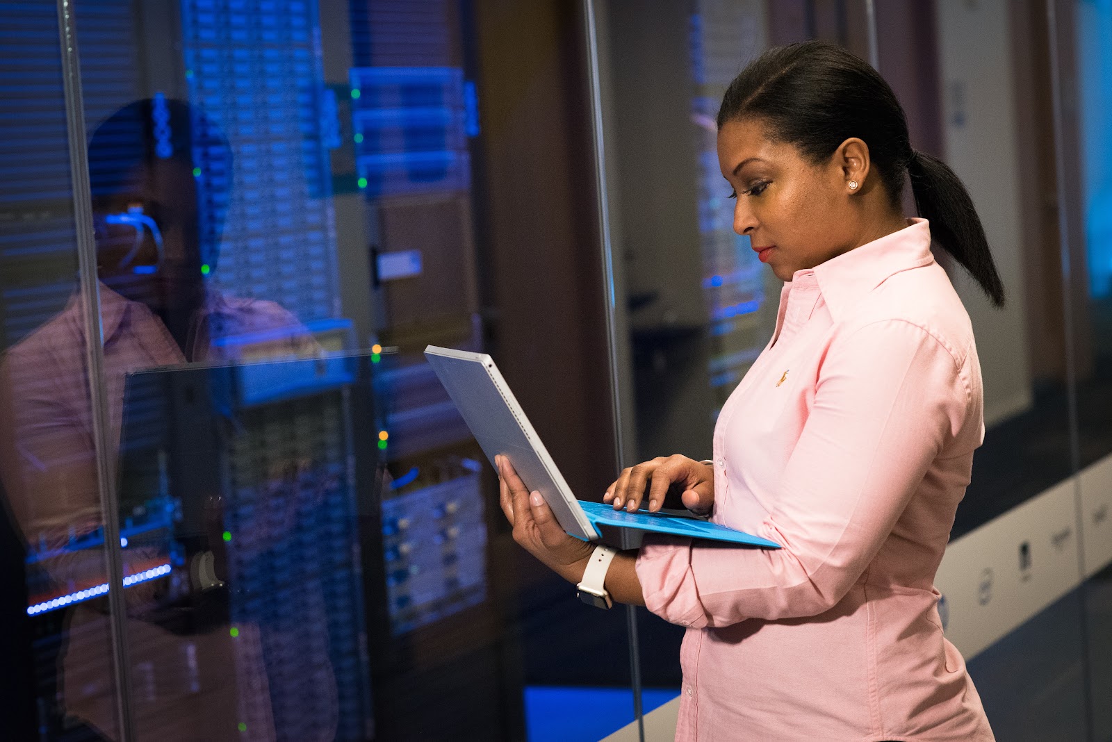 Woman is working with a laptop